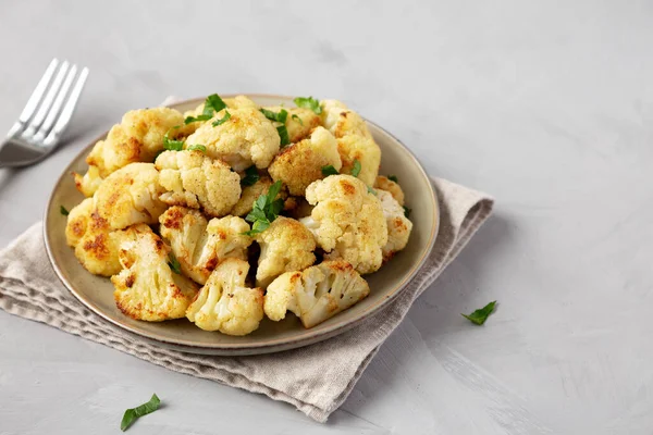 stock image Homemade Roasted White Cauliflower on a Plate, side view. Space for text.