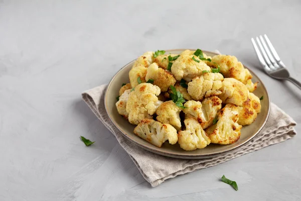 stock image Homemade Roasted White Cauliflower on a Plate, side view. Copy space.