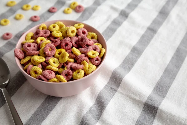 Colorful Cereal Loops with Whole Milk for Breakfast. Space for text.
