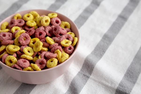 Colorful Cereal Loops with Whole Milk for Breakfast. Space for text.