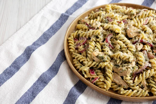 stock image Homemade Creamy Lemon Butter Chicken Pasta on a Plate, side view. Space for text.