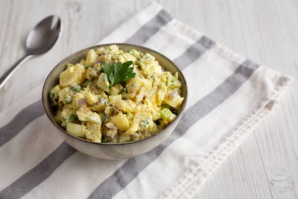 stock image Homemade Potato Egg Salad with Pickles in a Bowl, side view. Copy space.