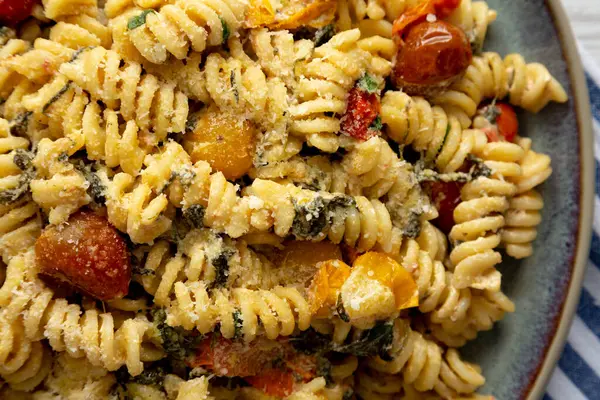 stock image Homemade Baked Boursin Pasta on a Plate, top view. Flat lay, overhead, from above.