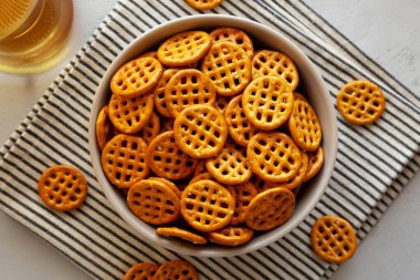 Organik Waffle Pretzels in a Bowl, top view.