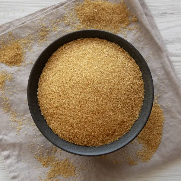 Organik Demerara Sugar in a Bowl, top view. Yakın plan..