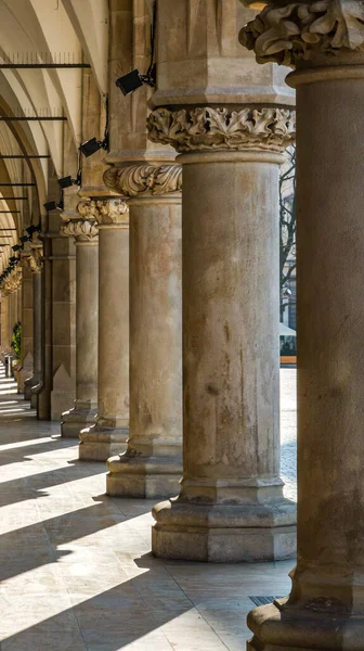Classical european architecture. Large columns. Sunlight and shadows.