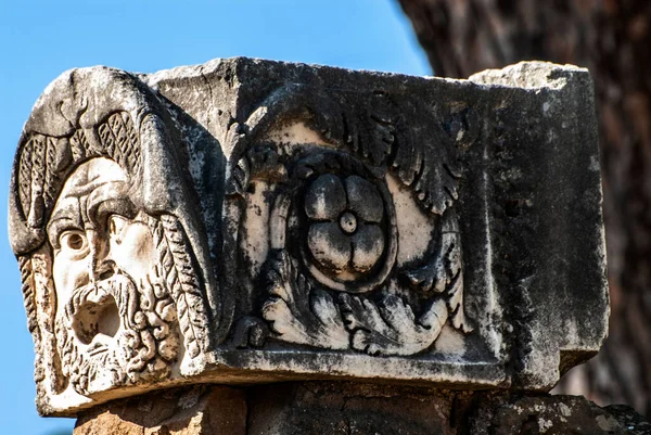 Stone Masks in the Roman Amphitheater Ostia Antica, Rome, Italy