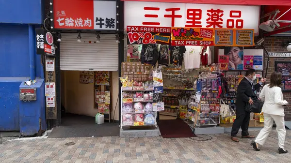 stock image Japan, April 2024 : Tax-Free Convenience Shop with Colorful Displays at Nakamise Dori in Sensoji shrine, Tokyo