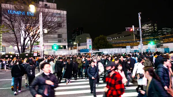 stock image Tokyo, Japan  APRIL 2024: street view by night in Ikebukero, Shinjuku, Harajuku, Shibuya, and Ebisu districts, Tokyo 