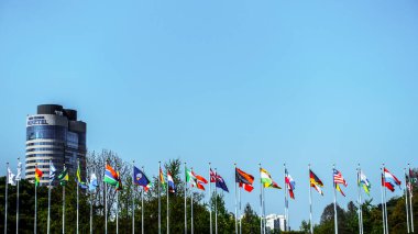 Seoul, South Korea, Olympic Park, with a row of flags (competing nations in 1988 the Olympic Games) fluttering in the background, Seoul, South Korea