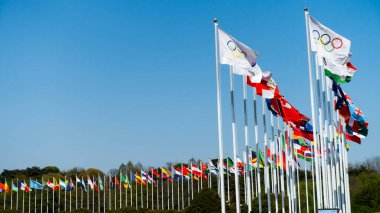 Seoul, South Korea, Olympic Park, with a row of flags (competing nations in 1988 the Olympic Games) fluttering in the background, Seoul, South Korea