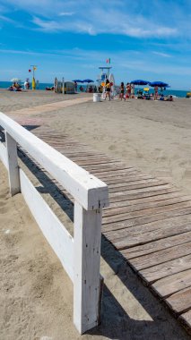 Lido di Ostia, Ostia, Ostia Lido, Rome, Italy, beach panorama with sun umbrellas and deck chairs in Ostia Lido, Rome, Italy