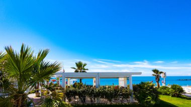 Lido di Ostia, Ostia, Ostia Lido, Rome, Italy, beach panorama with sun umbrellas and deck chairs in Ostia Lido, Rome, Italy