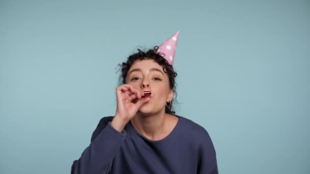 Close Happy Curly Woman Birthday Cap Blowing Whistle Celebrating Holiday — Stock video