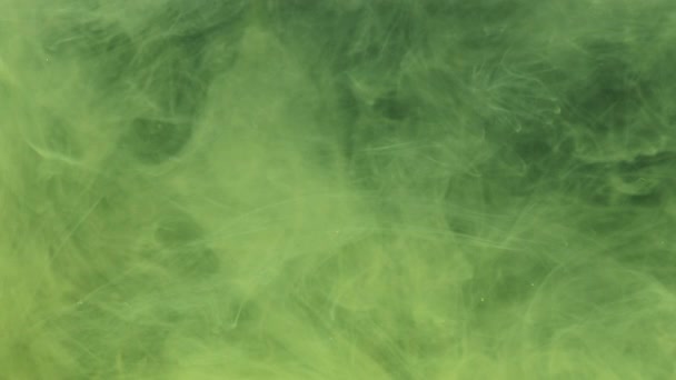 Tinta Verde Amarela Tinta Acrílica Misturando Água Girando Suavemente Debaixo — Vídeo de Stock