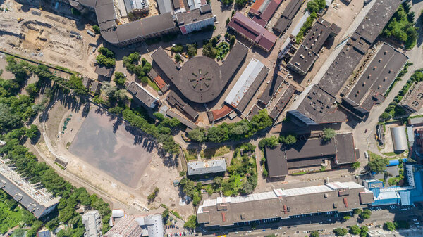 Aerial top view building former factory Arsenal. Drone shot beautiful Kyiv Kiev building on a sunny summer day. Capital of Ukraine. Reconstruction