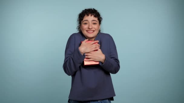 Happy Curly Woman Embraces Birthday Present Red Box Wonders What — Stock Video