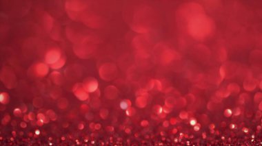 Parlak kırmızı yüzey dönüyor. Sihirli bokeh arka planı. Yüksek kalite fotoğraf