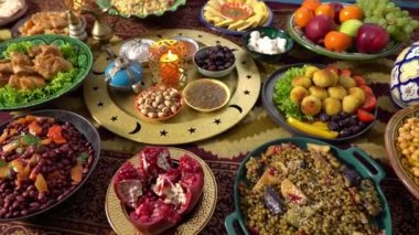 Ramadan mubarak, holiday table. Festive traditional Middle Eastern Muslim Halal foods. Celebration of Eid. High quality 4k footage