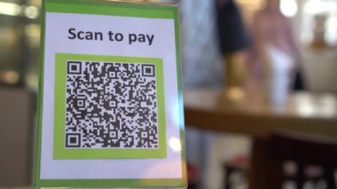 Pay touch-free with a QR code. QR code scanning app. Touchless digital payment option for businesses. High quality 4k footage