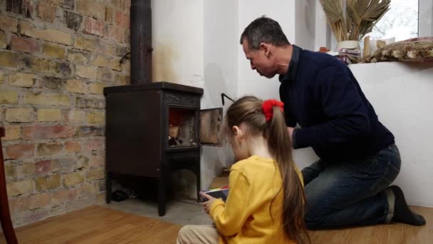 Man Child Heats House Fireplace Firewood High Quality Footage — Stock Video