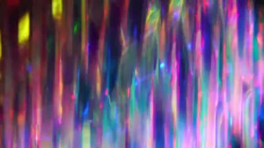 Parlak bir geçmişi var. Işık bir kristalin yüzeyinden geçer ve ışıl ışıl parlak ışıklar ve holografik tek boynuzlu at renkleri yaratır. Yüksek kalite 4k görüntü
