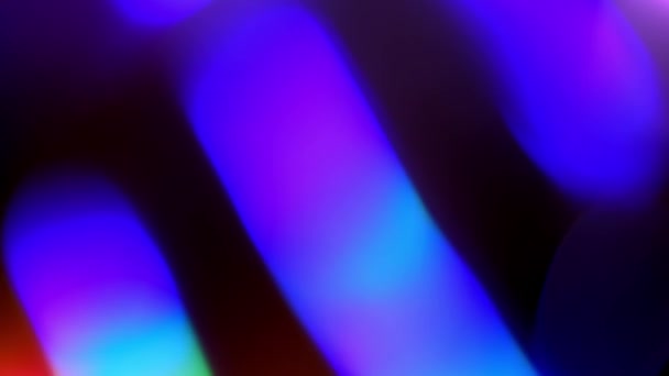 彩虹色的明亮的霓虹灯在黑色的背景上混乱地移动 高质量的4K镜头 — 图库视频影像