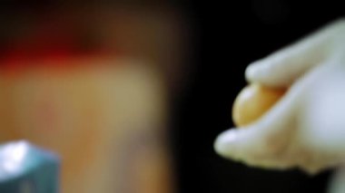 Broken Egg Shell Two Halves. Cooking Ingredients For Baking Sweets Cake For The Holiday. The Pastry Chef Separates The Egg White From The Yolk. 