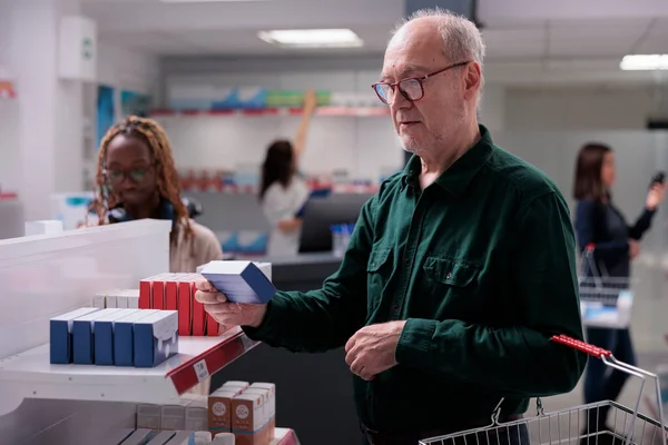 Senior Man Client Holding Shop Basket Pharmacy Looking Drugs Shelves — Stock Photo, Image