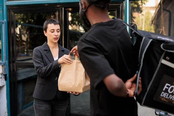 Office Food Delivery Service Courier Giving Woman Order Package African — Stock Photo, Image