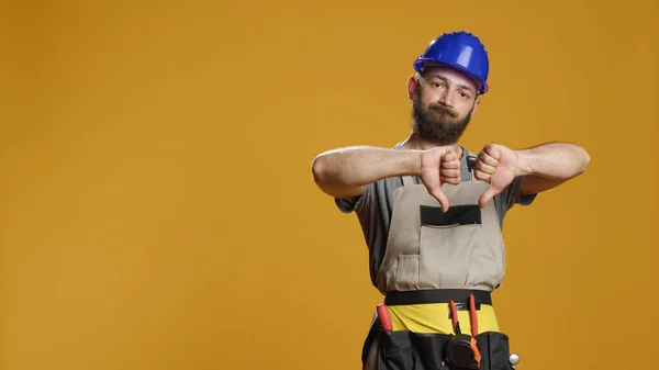 Portrait Construction Worker Giving Thumbs Studio Showing Disapproval Disagreement Doing — Stock Photo, Image