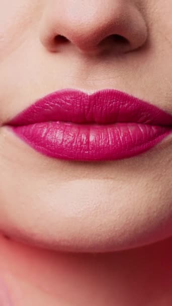 Vertical Video Cheerful Pretty Adult Pink Lipstick Biting Lips Studio — Stock Video