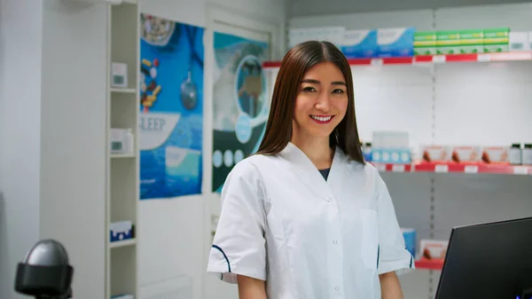 Happy Asian Pharmacist Working Drugstore Counter Examining Medicaments Pharmaceutical Products — Stock Photo, Image