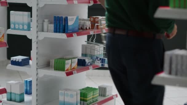 Young Adult Looking Medical Products Medication Shelves Buying Drugs Treatment — Stock Video