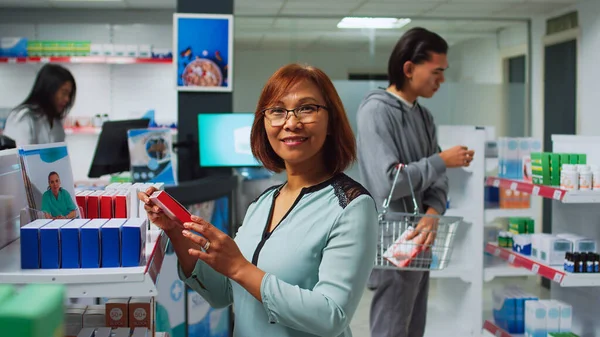Asian Woman Searching Medicaments Pharmacy Shop Looking Shelves Filled Pills — Stock Photo, Image