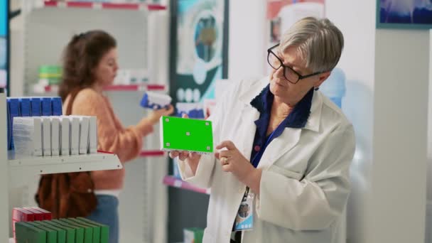 Woman Pharmacist Holding Box Pills Greenscreen Working Pharmacy Shop Specialist — Stock Video