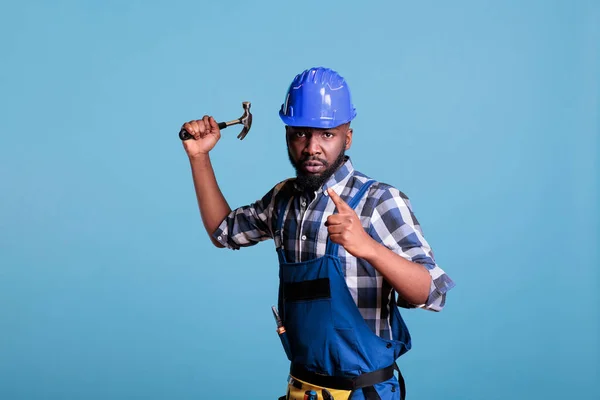 Aggressive Disruptive Construction Worker Raising Hammer Camera Fight Instigating Violence — Stock Photo, Image