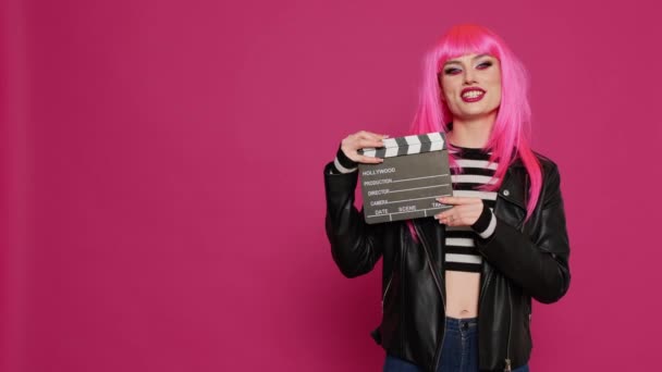 Cheerful Female Videomaker Holding Film Slate Saying Action Preparing Record — Stock Video