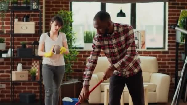 Diverse Couple Cleaning Apartment Tools Appliances Man Mopping Wooden Floors — Vídeo de Stock