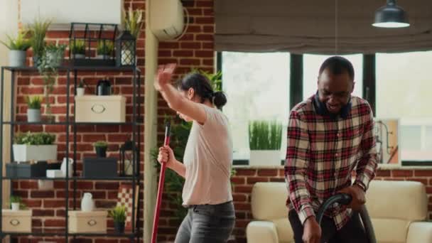 Young Life Partners Vacuuming Floors Showing Dance Moves Home Having — Vídeo de Stock