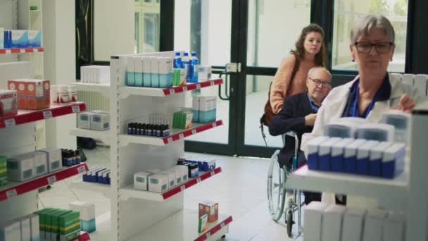 Wheelchair User Woman Caregiver Giving Prescription Paper Specialist Asking Buy — Vídeos de Stock