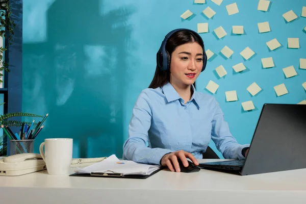 Professional Woman Working Laptop Headphones Listening Online Training Office Female — Zdjęcie stockowe