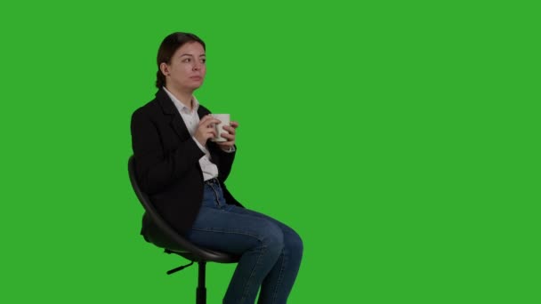 Side View Caucasian Businesswoman Holding Coffee Cup Chair Sitting Studio — Stockvideo