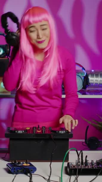 Vertical Video Smiling Artist Listening Remix Headphones While Mixing Eletronic — Vídeo de stock