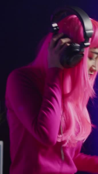 Vertical Video Pink Hair Playing Eletronic Song Professional Mixer Console — 비디오