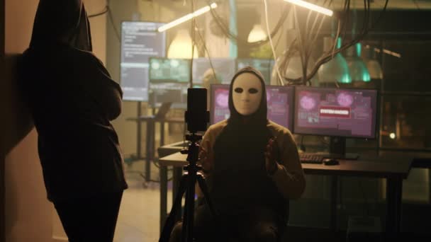 Skilled Cyber Criminal White Mask Recording Live Ransomware Video Dark — Vídeo de Stock
