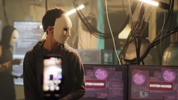 Female Hacker Mask Broadcasting Live Threat Video Asking Ransom Instead — Vídeos de Stock