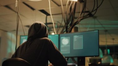 Female thief planning cyberwarfare and hacktivism at night, trying to break server firewall for cryptojacking or espionage. Criminal hacking network system on computer, anonymous.