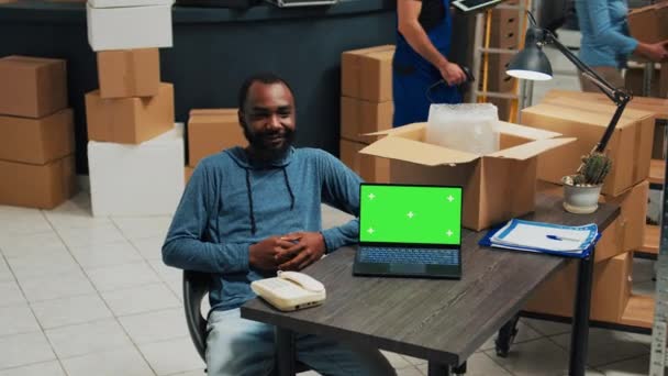 African American Man Using Laptop Greenscreen Template Planning Merchandise Shipment — Wideo stockowe