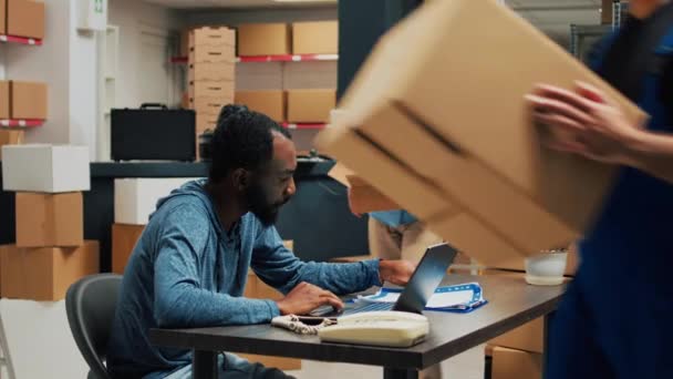 Diverse Startup Owners Putting Supplies Cardboard Packages Preparing Boxes Shipping — Vídeos de Stock